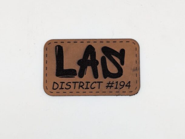 Custom leather patch by Patchefy with embossed logo for a classic and durable look